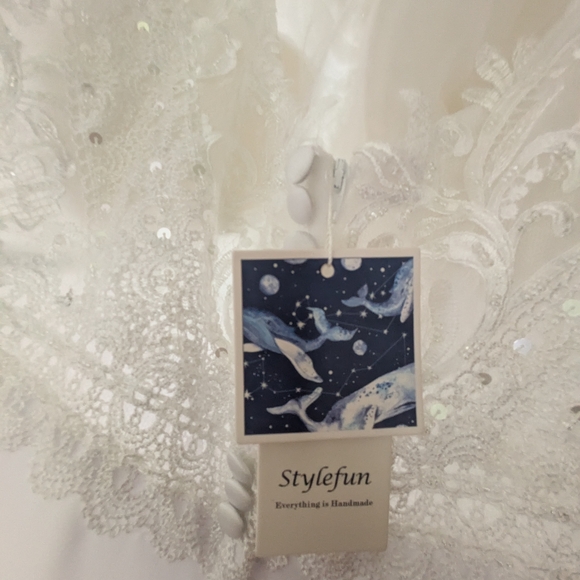 Elegant White Lace & Beaded Wedding Gown - Picture 5 of 12